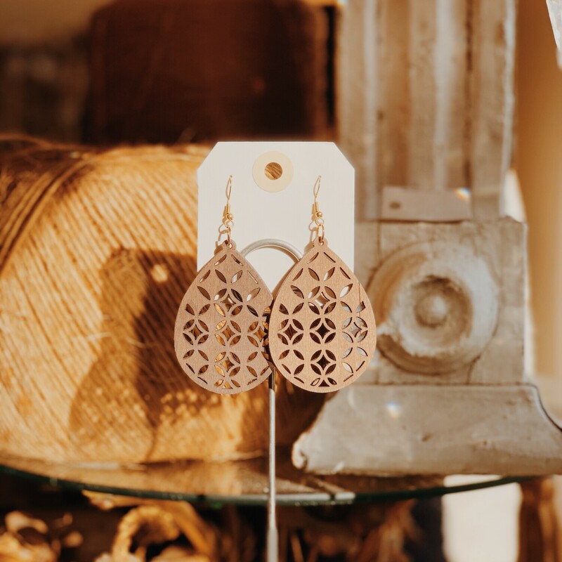 These beautiful wooden carved earrings measure 3.25 inches long!