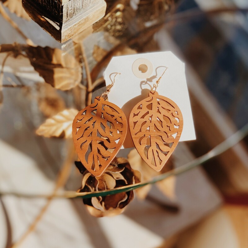 These gorgeous wooden carved earrings measure 3.5 inches long!