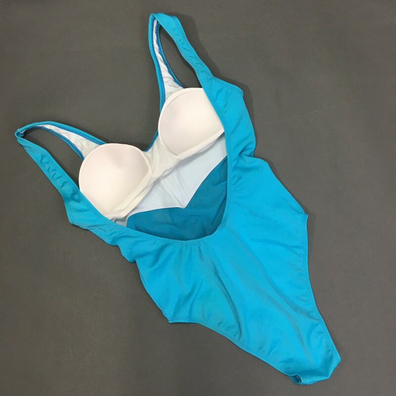 120-512  Caribe, Aqua one piece center mesh, fixed soft cups, scoop back,size 11  Nylon 80%  Spandex 20%<br />
Hand wash cold no bleach dry in shade. Made in Mexico<br />
4.95 oz