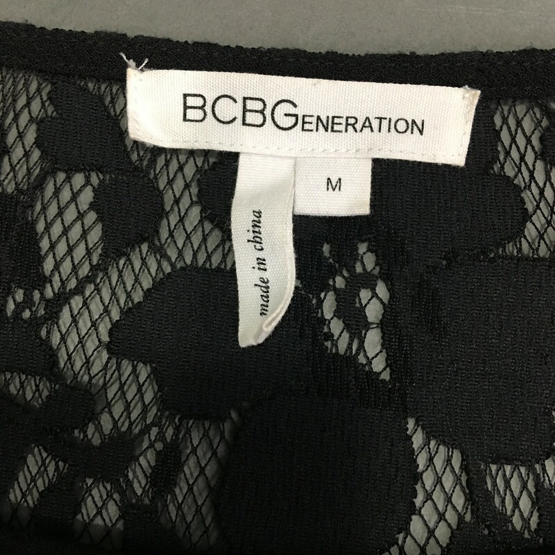 BCBGeneration, Black knee length Size: M, lace sleeves and back, no fabric tags, pullover, machine wash cold poly cotton spandex blend