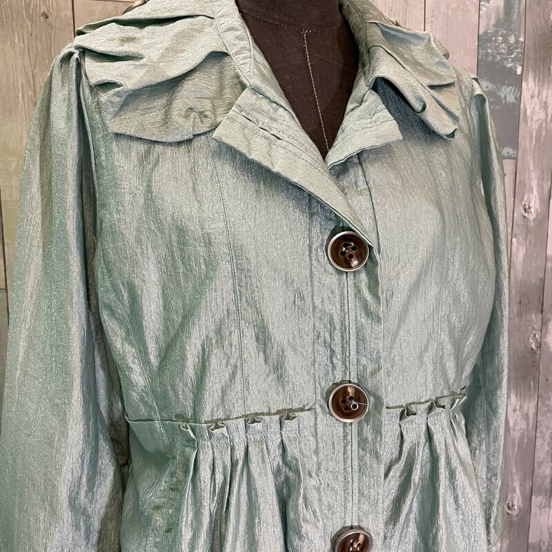Neyelle Coat<br />
Fully lined, 2 front side pockets, oversized buttones, ruffle collar<br />
Aqua shimmer<br />
Size: Medium