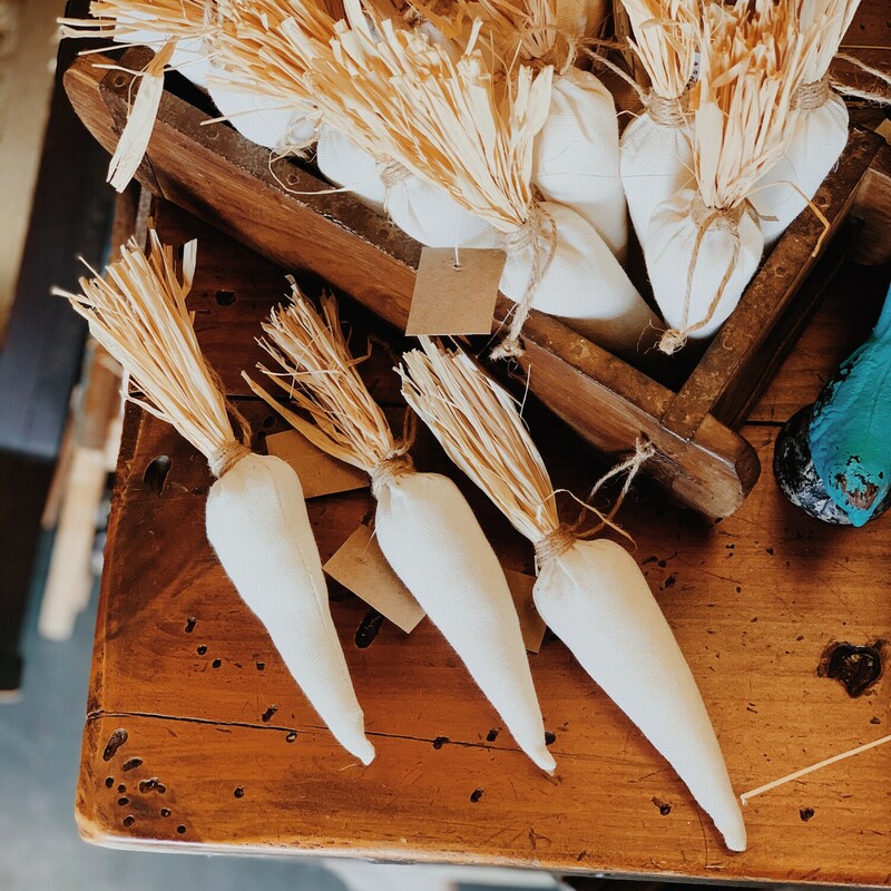 These adorable white linen carrots are perfect for Easter decorating! They measure about 9 inches long.