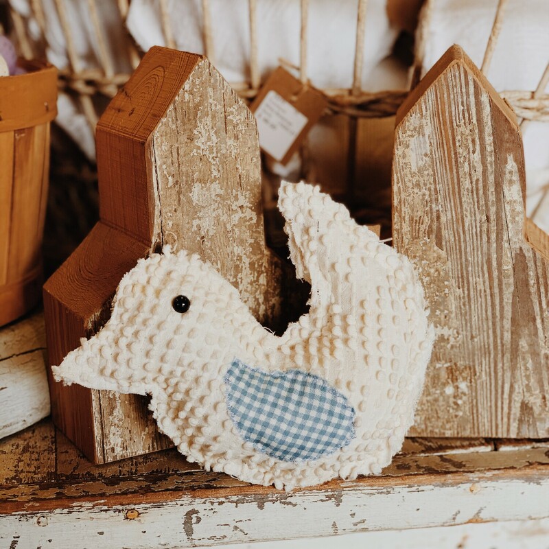 These adorable, handmade chicks were made from vintage fabrics! Because they were handmade from vintage fabrics, each chick varies and no two are exactly the same. They are available in pink or white!<br />
They measure about 7 inches wide by 6 inches tall.