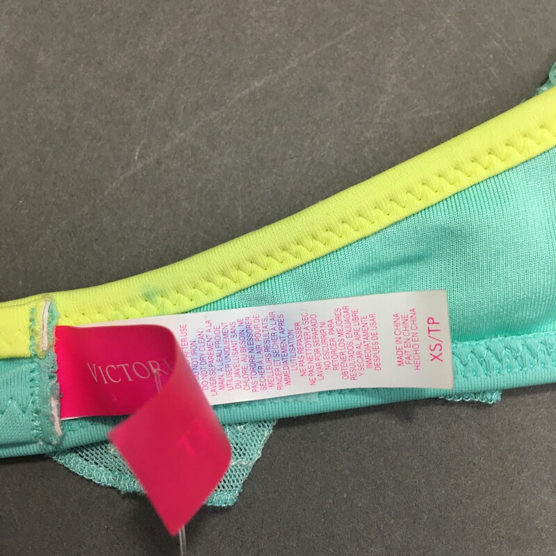 Victorias Secret Sequin bikini, Blue and neon yellow, Size: XS Juniors or Girls  top 80% polyester 20% elastane. Soft removeable cups.
Bikini bottom, Neon Yellow, Size: XS The suit has a marker name on theback of the  fabric tag
Hand Wash cold no bleach line dry. Made in Sri Lanka
4.00 oz