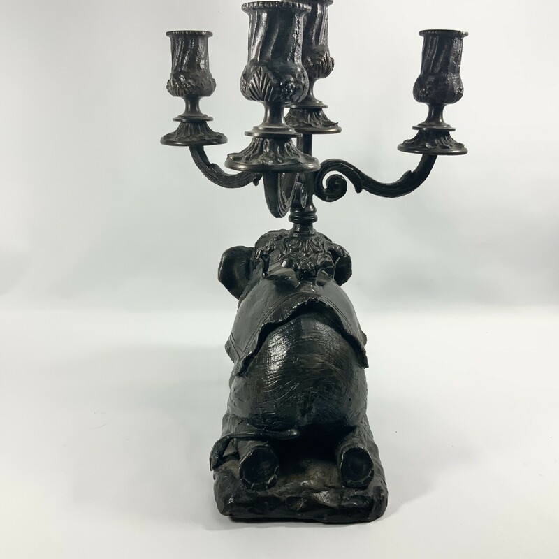 Beautifully crafted kneeling elephant candelabra 13.5 inches high 11 inches wide 10 inches deep.