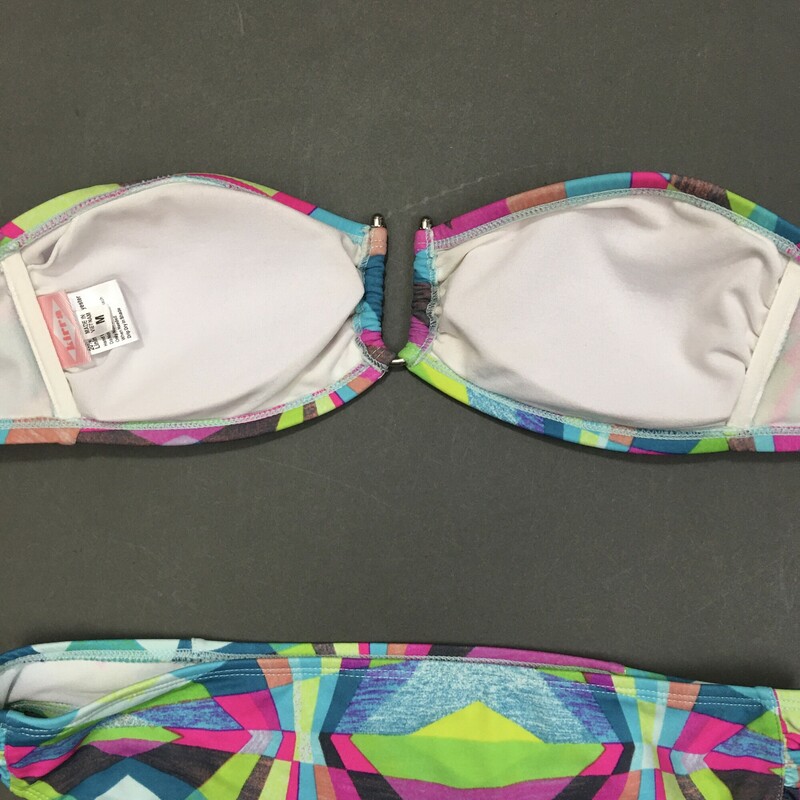 103-221 Kirra, Multicolor, Size M. 2 piece. Geometric aqua and green pattern bandeau style strapless top, with cute U shape joining hardware, and soft removeable cups. bikini bottom is classic low cut with ruche side fabric.  suit is fully lined, 80% nylon, 20% spandex, hand wash cold no bleach line dry in shade Made in Vietnam