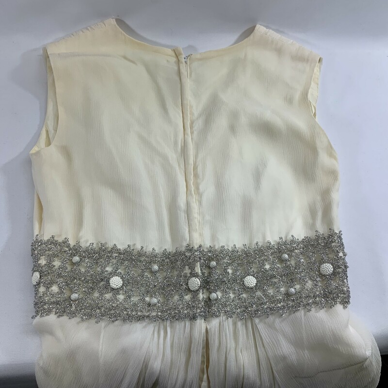 Floor length. Sleeveless. V-Neck.
Wide silver band waist with ivory button accents.
Back zipper and hook closure. Fully lined.
Approximately 25 inch waist.