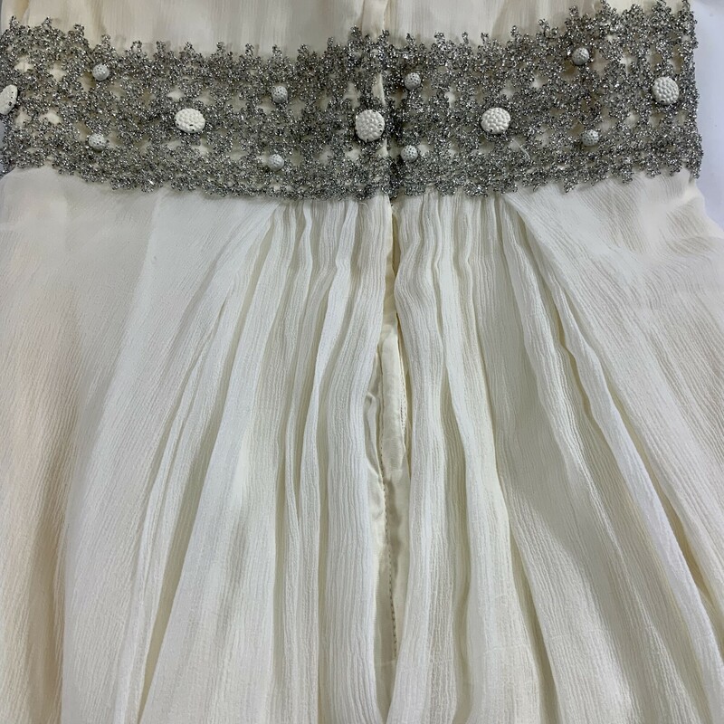 Floor length. Sleeveless. V-Neck.
Wide silver band waist with ivory button accents.
Back zipper and hook closure. Fully lined.
Approximately 25 inch waist.