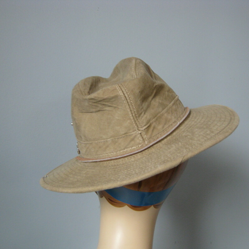 You don't have to leave glam and bling behind on your next desert trek!
This high quality Henchel canvas safari hat has been embellished with plastic jewels in nicely coordinating tones of amber and clear.
The hat has a suede thong with a button you can tighten to keep the hat in place if your camel picks up the pace a bit and you can snap one side of the brim to the crown for an extra dashing look.
Excellent condition, i had to glue one of the jewels back on and some of them are a little worn

Inner hat band: 20.75
Thanks for looking!
#45528