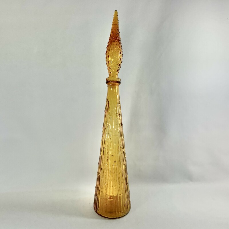 Vintage Retro amber Genie bottle. Approximately 22 inches H.