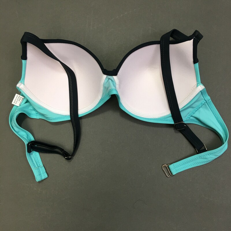 No Brand top soft fixed cups, adjustable shoulder straps, two-toned Aqua and Black top only, hook back, bosom has ruche fabric cups detail and center plastic \"jewel\" button.  Sized as: XL but looks more like an 8/10 C cup<br />
Made in China. HAnd wash cold, no bleach line dry in shade. 82% Polyester 18% elastine spandex.<br />
3.35 oz