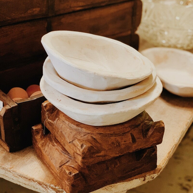 These rustic white dough bowls measure 7 inches across. They are perfect for decorating any table space!