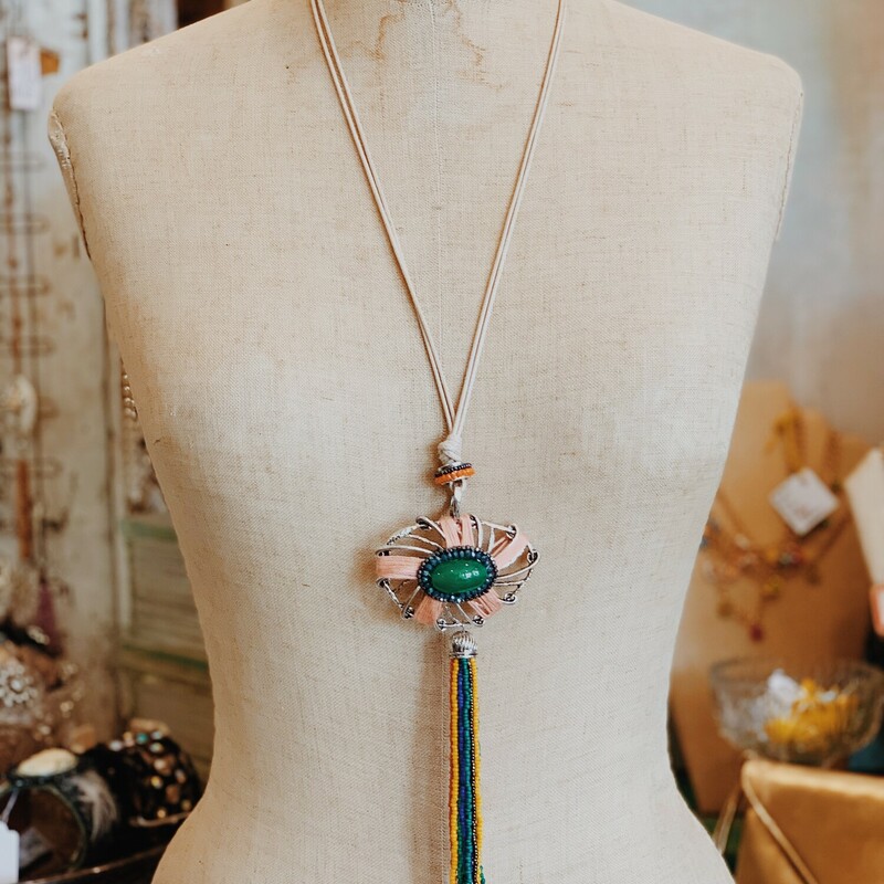 Another bold necklace brought to you by Resurrect! The colors in this are absolutely amazing and will most definitely stand out! Measuring 21.5 inches including the beaded tassle.