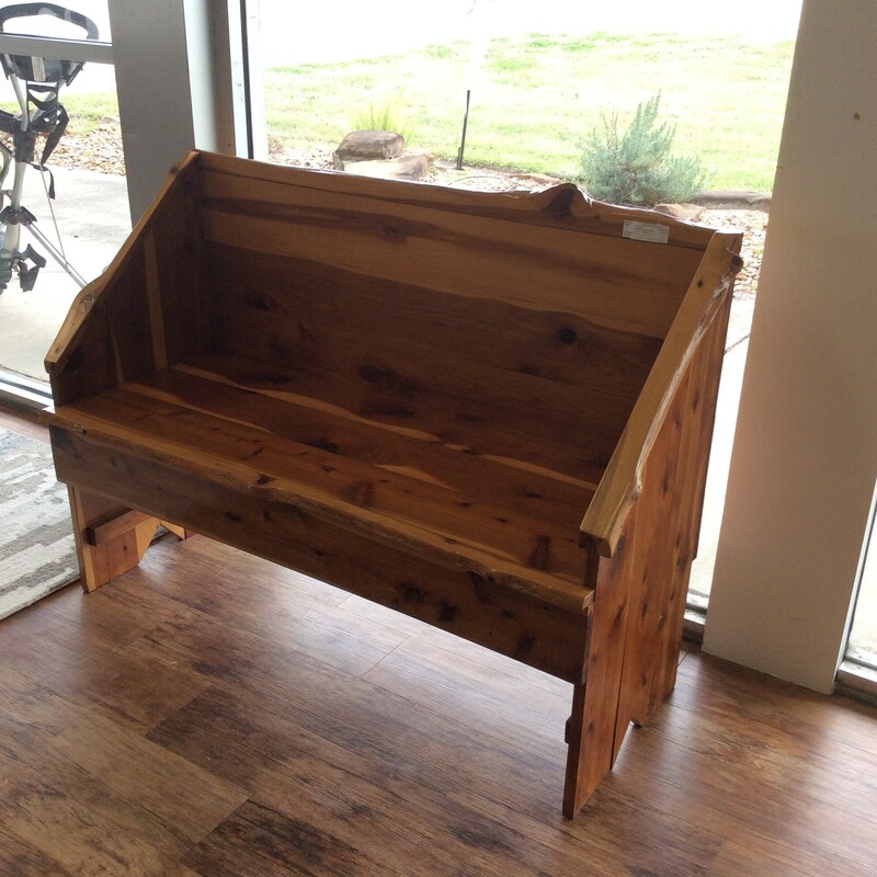 This is a nice custom-made cedar bench. Good condition.
