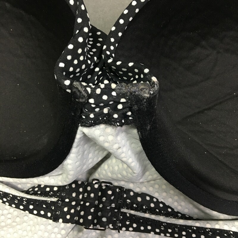 102-340 Black with white dotsTankini with built in cups, no maker, fabric or country of orign tags. shas adjustable straps, but shows fabric wear on sholder straps. Cups are in good shape, full underwire and estimated size D. There is wear on fabric. The back strap has adjustable 3 slotted hook.<br />
6.40 oz