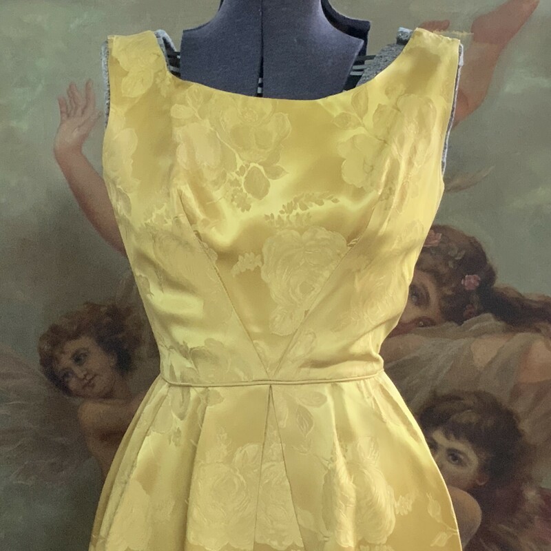 Stunning 1950s Gold Cocktail Dress Tag reads The Elaine Shop Jackson
Beautiful damask fabric Bow detail on back   Size XS  35 inch long  23 inch waist 32 inch bust  15 inch shoulders.