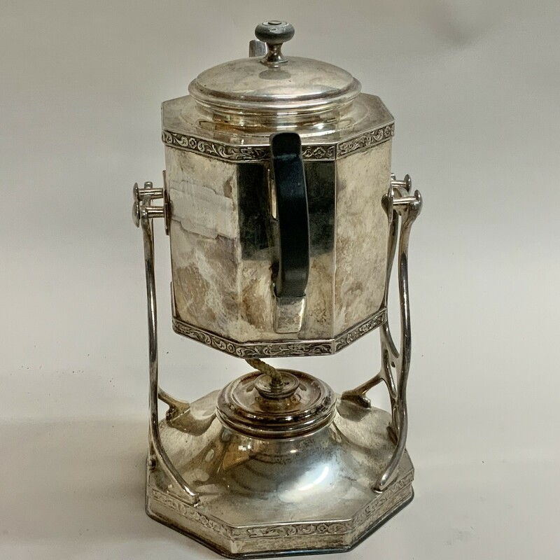 Vintage silver plated hot water kettle with stand and burner Used to keep water hot for the preparation of tea at the table<br />
Marked on the bottom of kettle see photo<br />
In fair condition has been vigorously polished over its lifetime and the silver plate is quite thin Black color handle and finial on lid have faded No dents or deep scratches still a very decorative piece<br />
Kettle and stand are 10.5 inches high