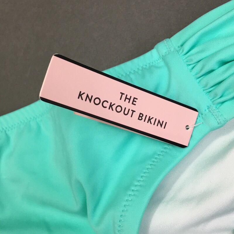 Victoria's Secret, the Knockout  Bikini Brief, Aqua, Size: Large. New with tag and panty liner. Fully lined, ruched sides. 80% polyester, 20% spandex. Hand wash cold, no bleach line dry shade. Made in China.<br />
2.3 oz