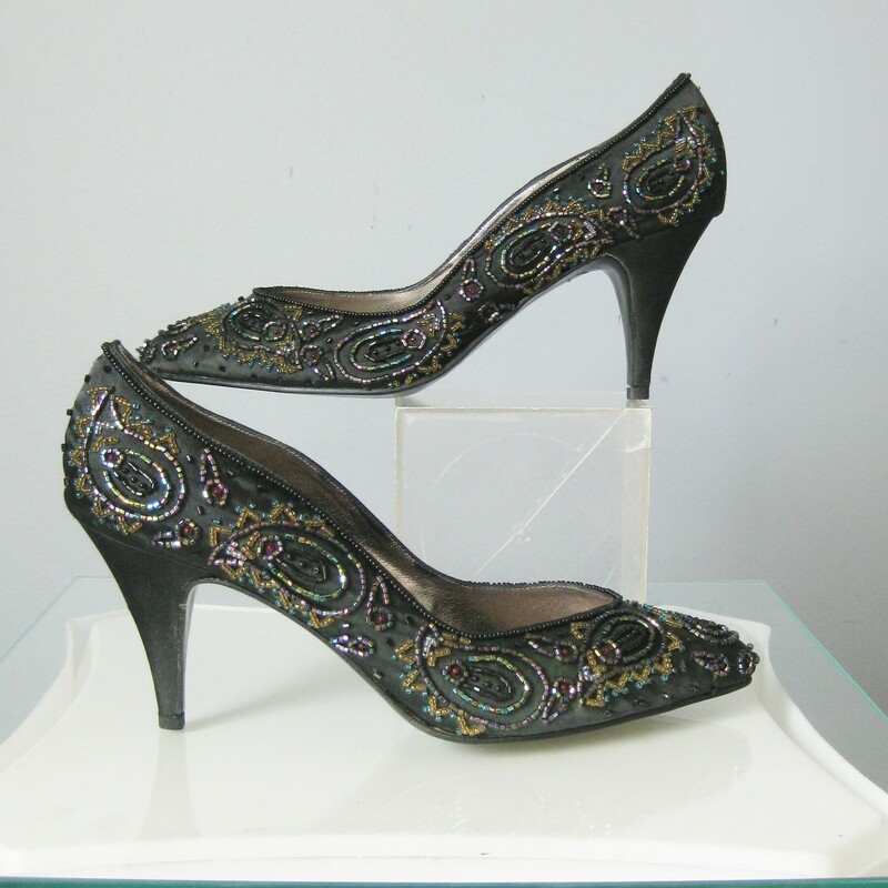 Stunning pair of heels by Impo<br />
<br />
Black satin with multi-color iridescent beading<br />
Size 7.5<br />
Worn once, perfect condition<br />
<br />
These are stiff-ish shoes.  True to size but will not be forgiving to larger feet.<br />
<br />
<br />
Heel : 3<br />
<br />
thanks for looking!<br />
#45527