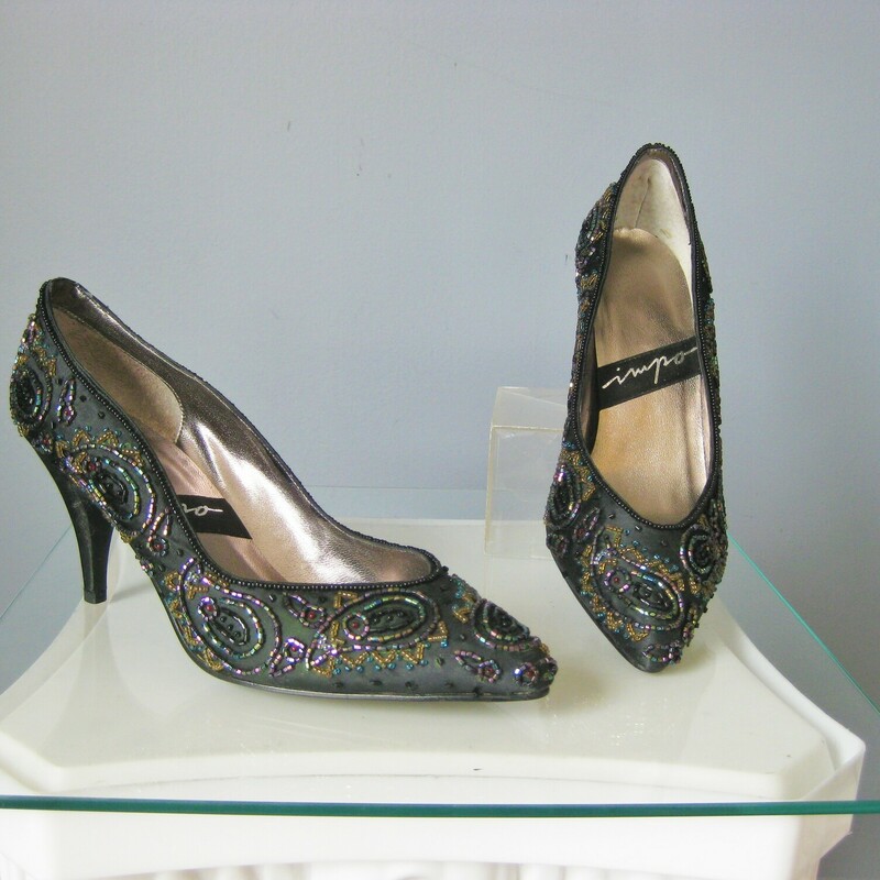 Stunning pair of heels by Impo

Black satin with multi-color iridescent beading
Size 7.5
Worn once, perfect condition

These are stiff-ish shoes.  True to size but will not be forgiving to larger feet.


Heel : 3

thanks for looking!
#45527
