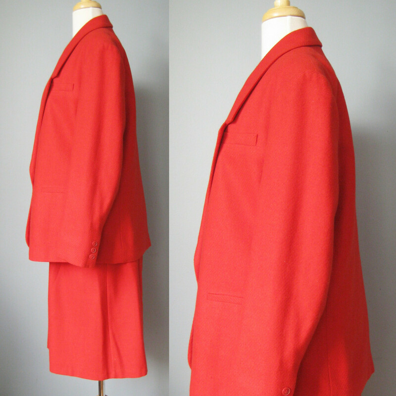 Two piece outfit from Classic Fashions a Sears line.
Made in Taiwan
It's made of a 65/35 Poly / wool blend fabric in bright red.

The has a single button, notched collar and pockets
The skirt has an elastic waist and big patch pockets

Great condition except two of the buttons have lost a bit of the yarn covering them as shown.

Here are the flat measurements:
Jacket:
Shoulder to shoulder:18.25
Armpit to Armpit : 26
Waist: 20.5
length: 26.5
underarm sleeve seam: 17.25

Skirt:
waist: 13.5-15.5 stretchy
Hips: 23.5
Lengths; 26.75

Thank you for looking.
#41026