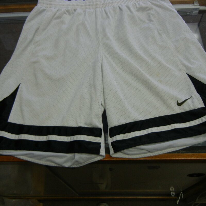Nike Men's Basketball Mesh with lining Shorts Size XL White Polyester #9942
Rating:   (see below) 3 - Good Condition
Team: n/a
Player: N/A
Brand: Nike
Size: XL - Men's(waist 34\"; Length 23\"; Inseam 10\") 
measurements are from armpit to armpit and from shoulder to hem; - please check measurements. 
Color: White
Style: Basketball Shorts; Embroidered logo; Elastic waist; Drawstring; Mesh with lining
Material: 100 Polyester
Condition: - Good Condition - wrinkled; Snags throughout the front and the back; Material is discolored; Stains on the right leg above the logo; Light stain on the front of the right leg; Definite signs of use(See Photos for condition and description)
Shipping: $4.34
Item #: 9942