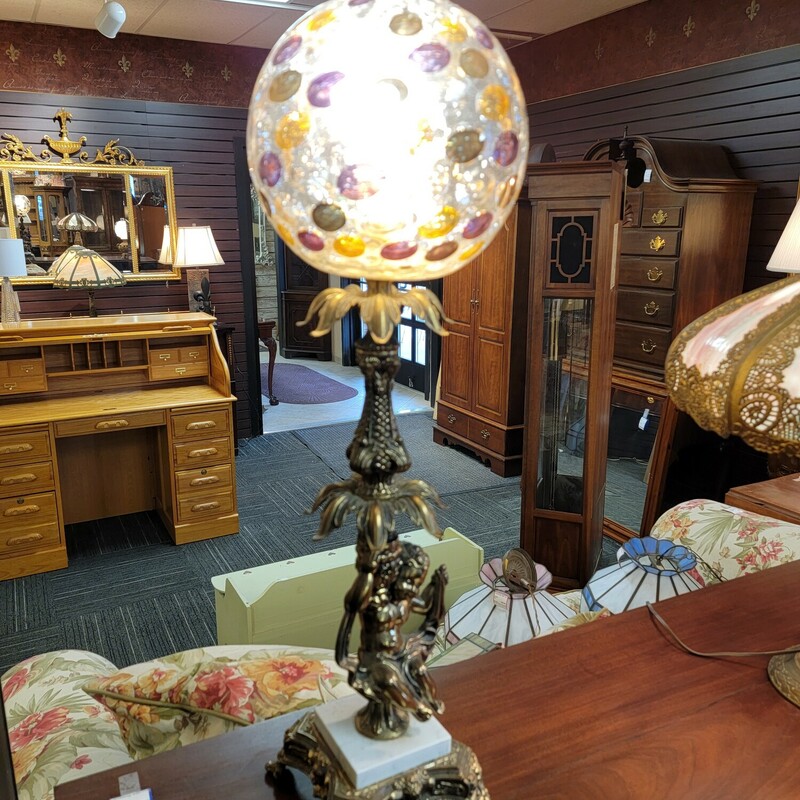 Vintage French Cherub Lamp Circa 1960.  Has metal and marble base with an Itailan globe.  Excellent condition.   Measures 29' tall.