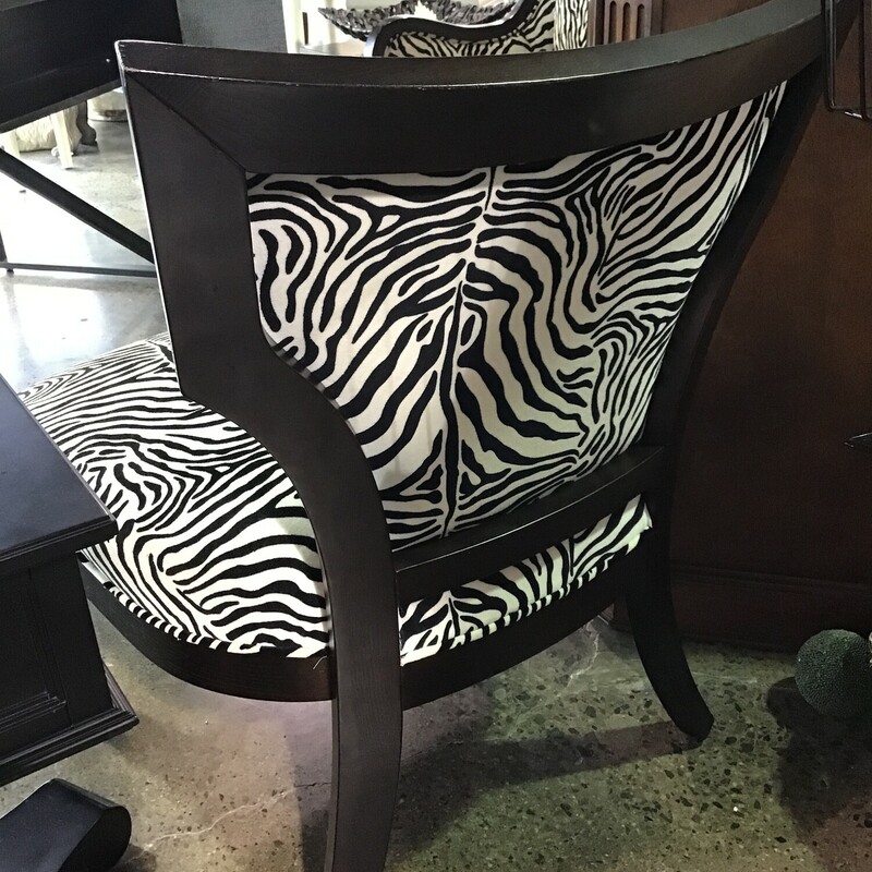 Adorable Zebra Print Chair in a black and cream fabric.  Seat back has upholstery on both sides and the seat has a nice large comfortable cushion.

Dimensions: 26x24x35