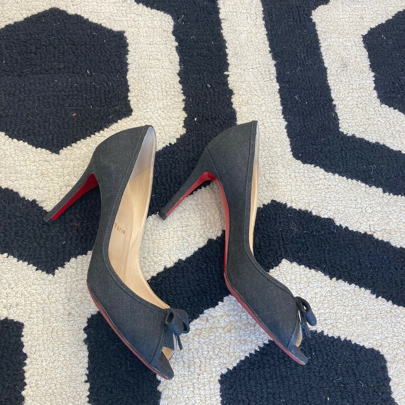 Louboutins: Red bottoms at Fashion Exchange!
Barely worn and ready for a new home.  Stride through the summer with extra class.  Size 39 (8.5) Gray.