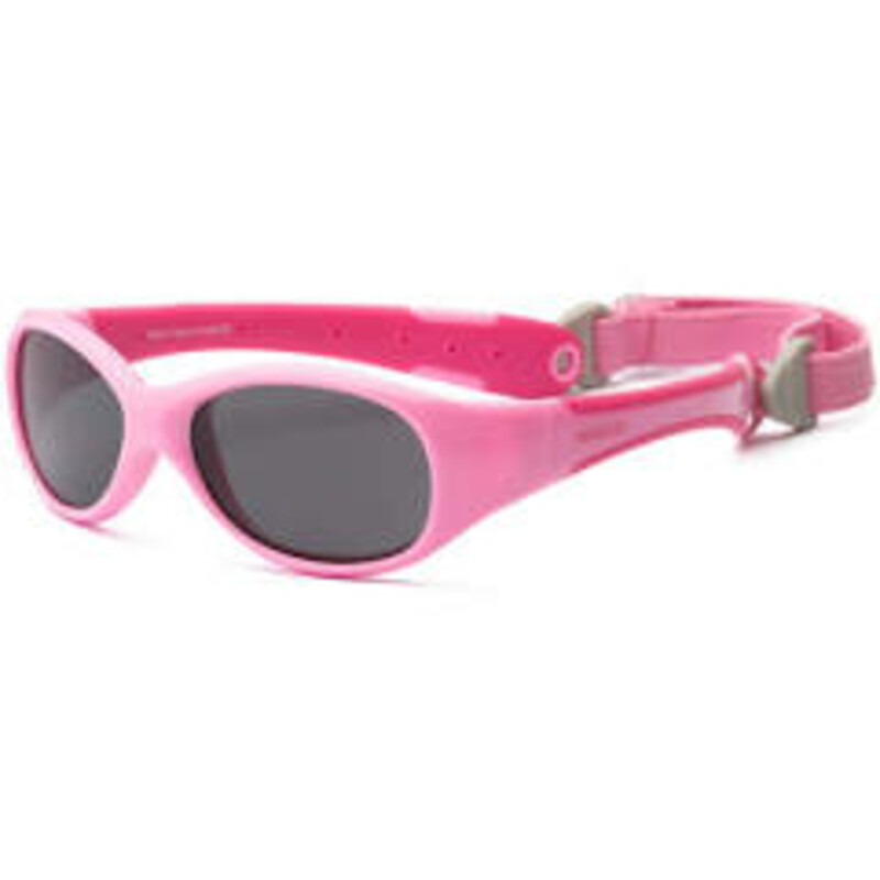 Real Shades with Strap, Explorer - Pink, Size: Baby 0+
oddlers are prepared for any adventure when they are wearing their Explorer sunglasses! A wrap around frame minimizes exposure to peripheral light while the soft, adjustable strap ensures these glasses will be comfortable and stay put. Explorer is also available with P2 technology, providing both polarized and polycarbonate lenses.

Features:
Unbreakable
100% UVA/UVB Protection
Sized to Fit
Wrap Around Frames
Shatteproof Polycarbonate Lenses
Flex Fit
Removable Band
Flex Fit, Wrap, Banded
Flex-Fit frames, made of TPEE, a rubber like material that bends and twists but does not lose its shape. Polycarbonate lenses. Lead-Free, No Bisphenol-A, No Phthalates