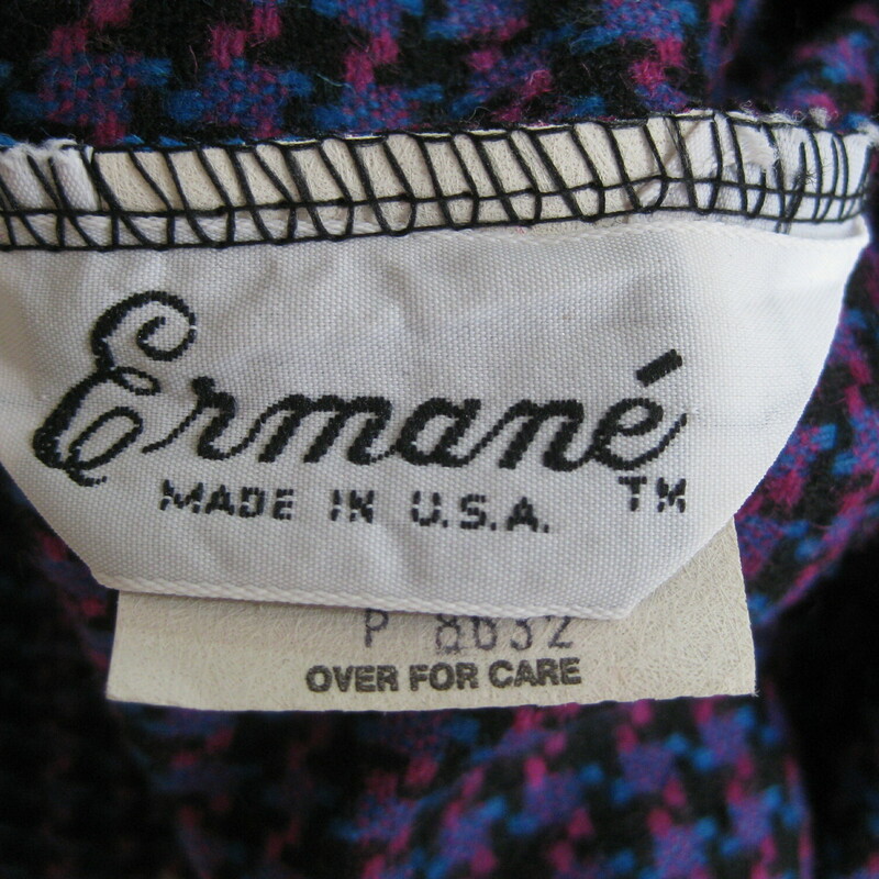 Vtg Ermane Wool, Purple, Size: Medium<br />
Simple skirt in a classic weave in fun colors.<br />
Purple black teak and pink houndstooth check<br />
a line skirt with elastic waist<br />
unlined, belt loops, pockets<br />
marked size 15/16 but better for a size modern 10/12<br />
Flat measurements, please double where appropriate:<br />
Waist: 14.75<br />
Hips: 22.5<br />
Length: 28<br />
<br />
Thank you for looking.<br />
#41001