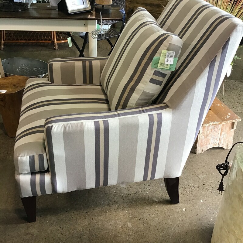 Kick back and relax in this comfortable Striped Upholstered Armchair with a loose back cushion . You'll love lounging and reading your favorite book in this stunning armchair.  Features a neutral fabric in cream, clay, browns and greys.

Dimensions:  31x38x39