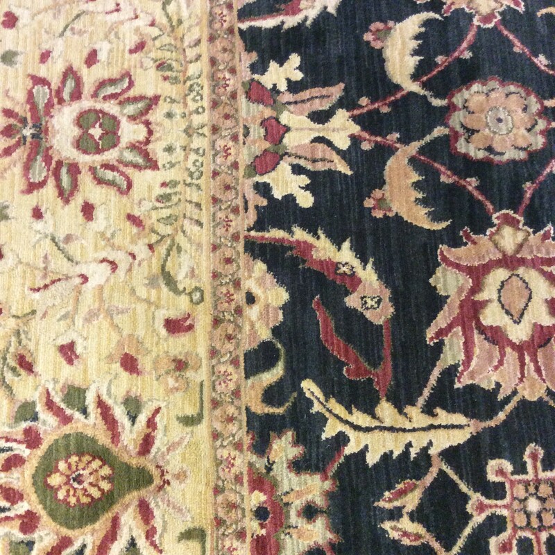 This area rug by Nourison is from The Persian Empire Collection. It's multi-colored and measures 7' x 12'.