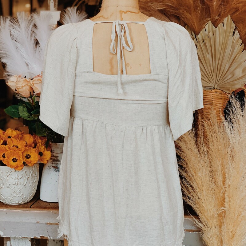 These gorgeous oatmeal colored tops have a smocked chest with flowy sleeves, and are made of a beautiful linen fabric!