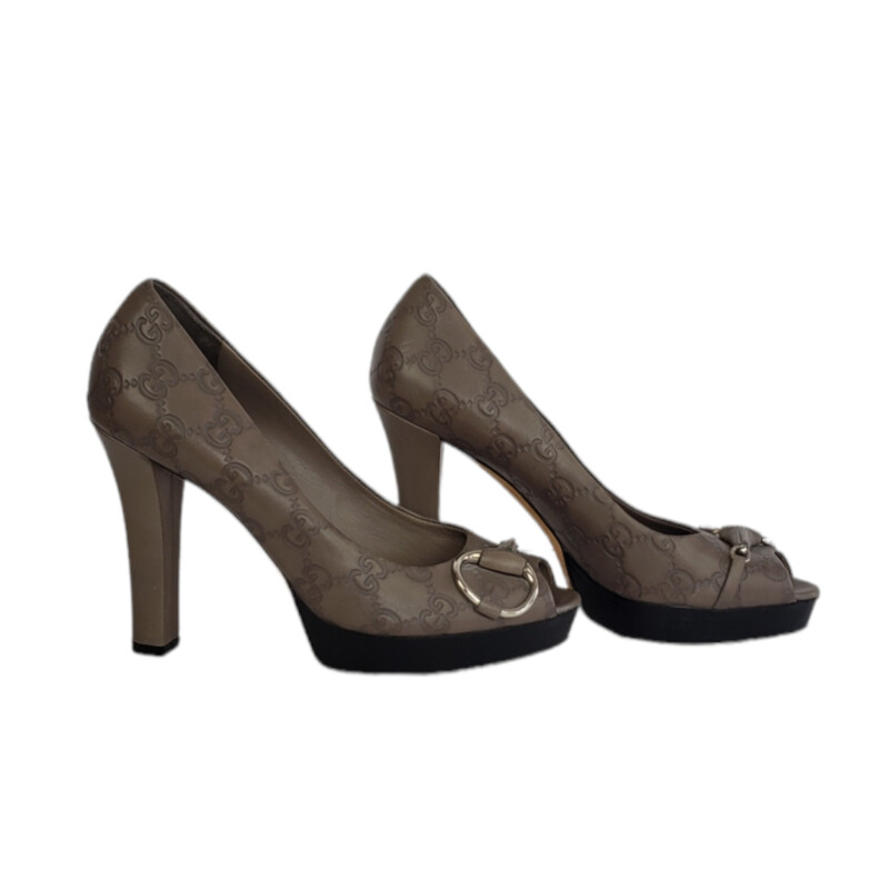 Gucci GG Embossed Heel<br />
<br />
Taupe<br />
<br />
Size: 36.  90 cm Heel<br />
<br />
Condition: Great. Minimal Wear