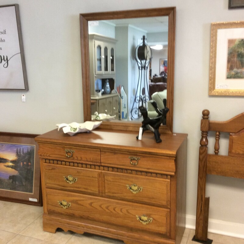 Bassett Dresser Mirror with a Tigerwood finsh. This desser includes 4 drawers and dental trim detail.