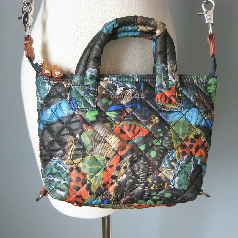 MZ Wallace Quilted Mini, Blk/mult, Size: None<br />
rare MZ Wallace Crossbody in a blue/orange/black abstract graphic print.<br />
smallish, perfect for travel, packable and crushable<br />
Strong leather reinforced web strap can be removed and adjustted.<br />
Leather trim<br />
Silver hardware<br />
<br />
10 x 7.25 x 3.25<br />
Strap Drop: 16 to 26.5<br />
handle drop: 3<br />
<br />
perfect condition!<br />
Thanks for looking!<br />
<br />
#47482