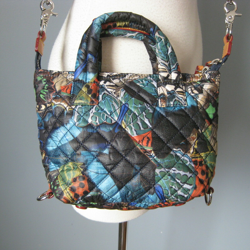 MZ Wallace Quilted Mini, Blk/mult, Size: None<br />
rare MZ Wallace Crossbody in a blue/orange/black abstract graphic print.<br />
smallish, perfect for travel, packable and crushable<br />
Strong leather reinforced web strap can be removed and adjustted.<br />
Leather trim<br />
Silver hardware<br />
<br />
10 x 7.25 x 3.25<br />
Strap Drop: 16 to 26.5<br />
handle drop: 3<br />
<br />
perfect condition!<br />
Thanks for looking!<br />
<br />
#47482