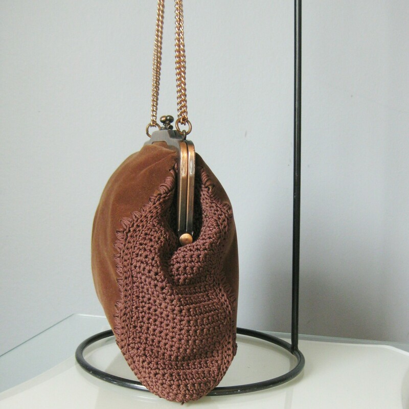 Vtg Walborg Crochet, Brown, Size: None<br />
You can't go wrong with this little brown bag in your wardrobe. Great for occasions where you need to be able to sling a bag over the crook of your arm or shoulder but also dangle from the fingers or sit prettily on the table. It has a sturdy and perfectly working metal frame and a long metal chain in a coppery colored metal.<br />
<br />
It's made of brown fabric, which feels like microfiber (brushed cotton?). Inside is a gorgeous dull green faille lining with a slip pocket and the Walborg Label.<br />
<br />
Easily will fit your phone, keys, cards and a bit of touch up makeup.<br />
<br />
Measurements:<br />
Width at widest spot: 9.5<br />
Height: 8.75<br />
Chain Drop: 7 3/4 when doubled, 16 single<br />
<br />
Amazing condition!<br />
<br />
Thank you for looking.<br />
#42131