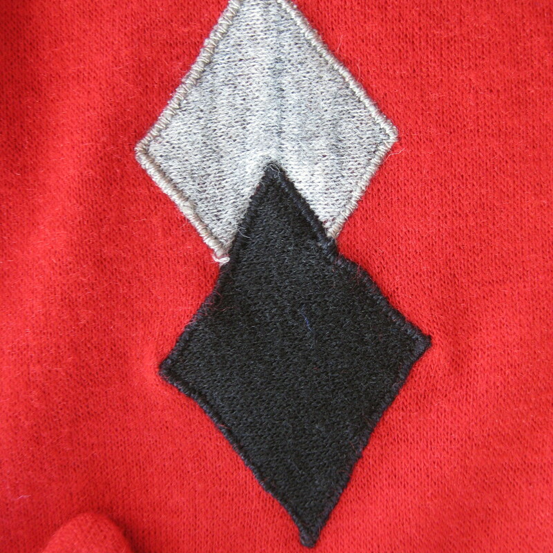 Cool bright red vintage shirt with a black and gray diamond applique decoration on the right side of the chest and a pocket on the left side.  Long Sleeves with a pointy collar and three buttons at the neck.  Button cuffs<br />
<br />
By Charles Dobbs<br />
<br />
<br />
No fabric tags.  It feels like soft felty acrylic, not a knit, no stretch to speak of, lightweight.<br />
<br />
The style is masculine but it's small so make sure these measurements will work for you.<br />
<br />
shoulder to shoulder: 17.75<br />
armpit to armpit: 19.5<br />
width at hem: 18.75<br />
underarm sleeve seam: 19.25<br />
length: 25<br />
<br />
excellent condition!<br />
thanks for looking!<br />
#41307