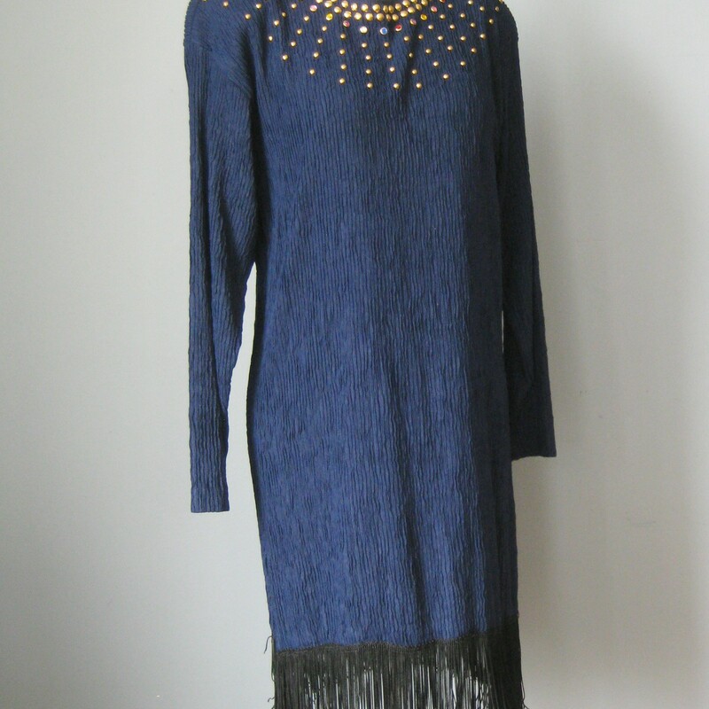 Super fun dress in a crinkly stretchy synthetic fabric with long sleeves, fringed hem and jeweled bodice.<br />
Pretty deep true blue in color.<br />
Unlined<br />
by Bonnie Blair<br />
<br />
Flat measurements:<br />
Shoulder to shoulder: 17<br />
Waist: 18<br />
Armpit to armpit: 18 1/2<br />
hip: 19<br />
Underarm sleeve seam length: 18<br />
Overall length: 36 1/2<br />
<br />
Thanks for looking!<br />
#797
