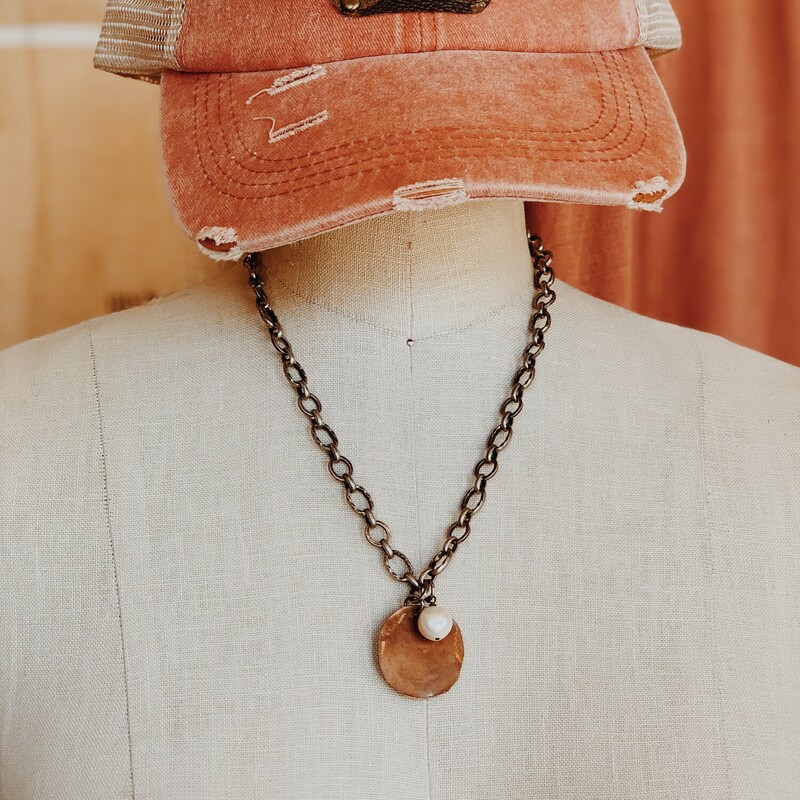 This is the perfect little rustic necklace! It is gorgeous on its own, or you can layer it with others!

It is on an 18 inch chain.