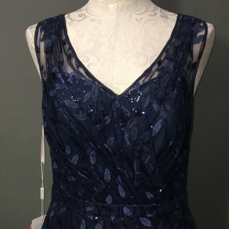 JJs House, Navy, Size: 6 New with tags<br />
US suze 6, UK 10, EU38<br />
Bust 34.50 Waist 27.50 ID 147962<br />
<br />
Silhouette: Sheath/Column<br />
Neckline: V-neck<br />
Length: Floor-Length<br />
Embellishment: Sequins<br />
Fabric: Tulle<br />
Straps: Regular Straps<br />
Sleeve: Sleeveless<br />
Back Style: Zipper Up<br />
Fully Lined: Yes<br />
Built-In Bra: Yes<br />
Boning: Yes<br />
Shown Color: Dark Navy<br />
Size: 6<br />
Season: Winter, Spring, Summer, Fall