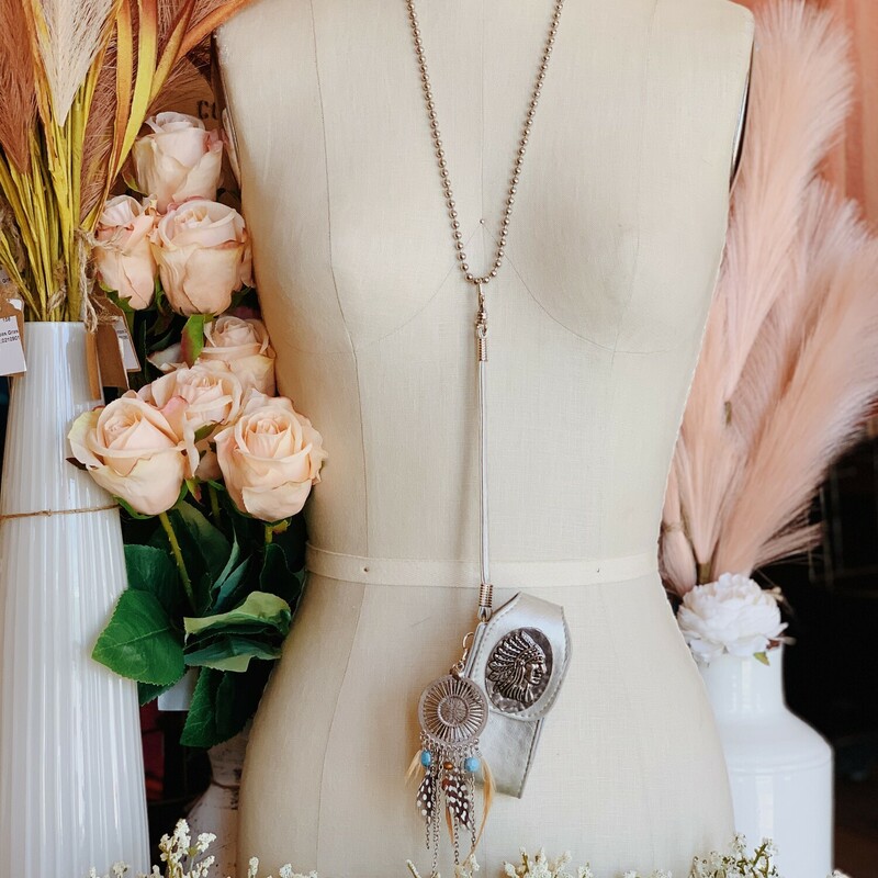 This one of a kind, handmade necklace is on a 26 inch chain.
