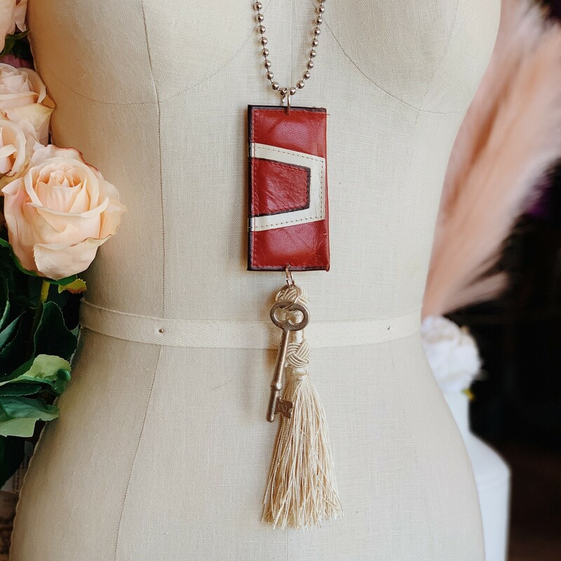 This one of a kind, handmade necklace is on a 28 inch chain.