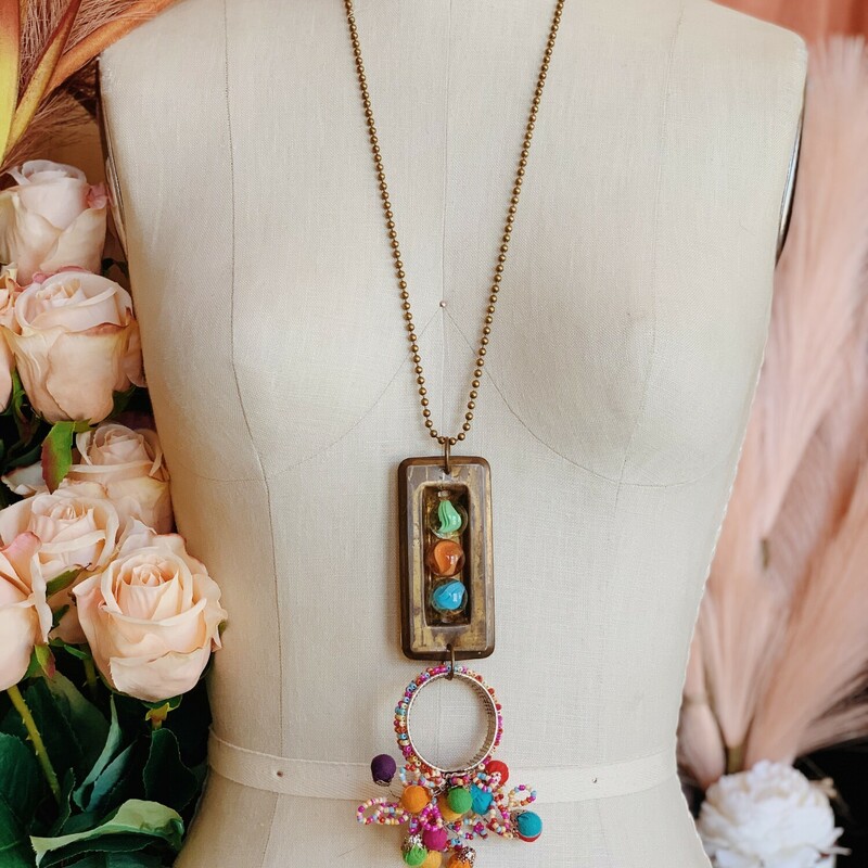 This one of a kind, handmade necklace is on a 28 inch chain.