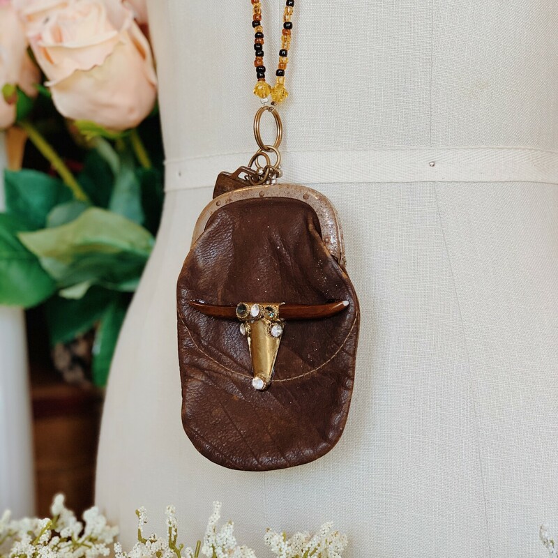 This one of a kind, handmade necklace is on a 36 inch chain.
