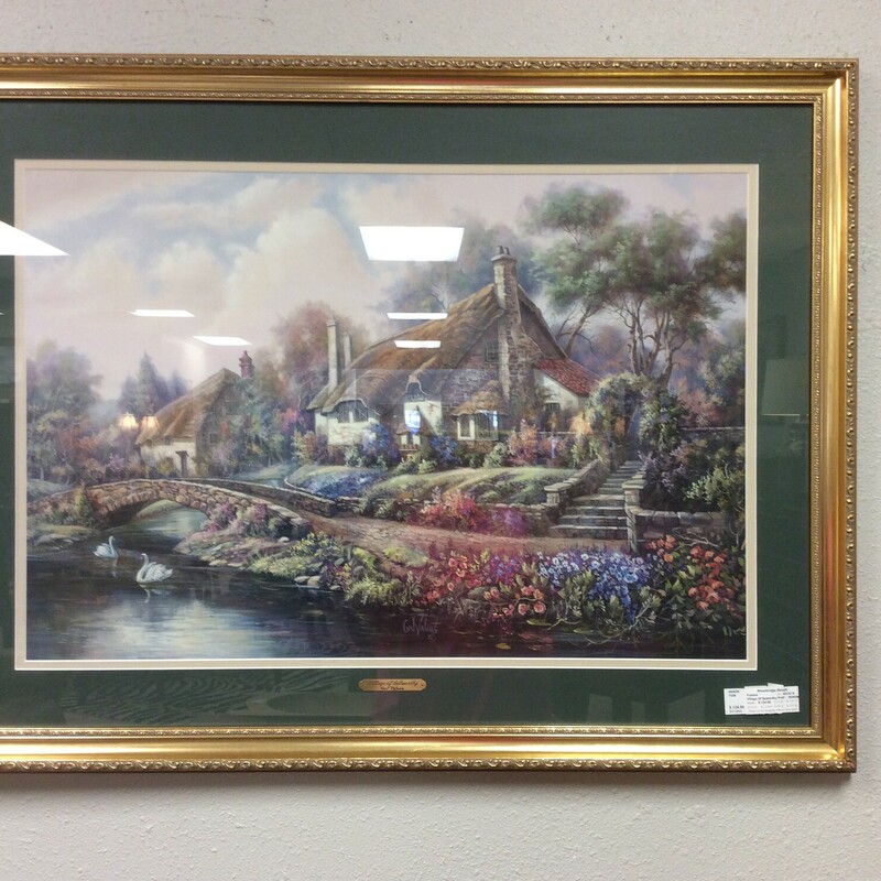 This is a Carl Valente Village of Selworthy Print. This Print is sign by Carl Valente, has a green matting and  beautiful gold frame.