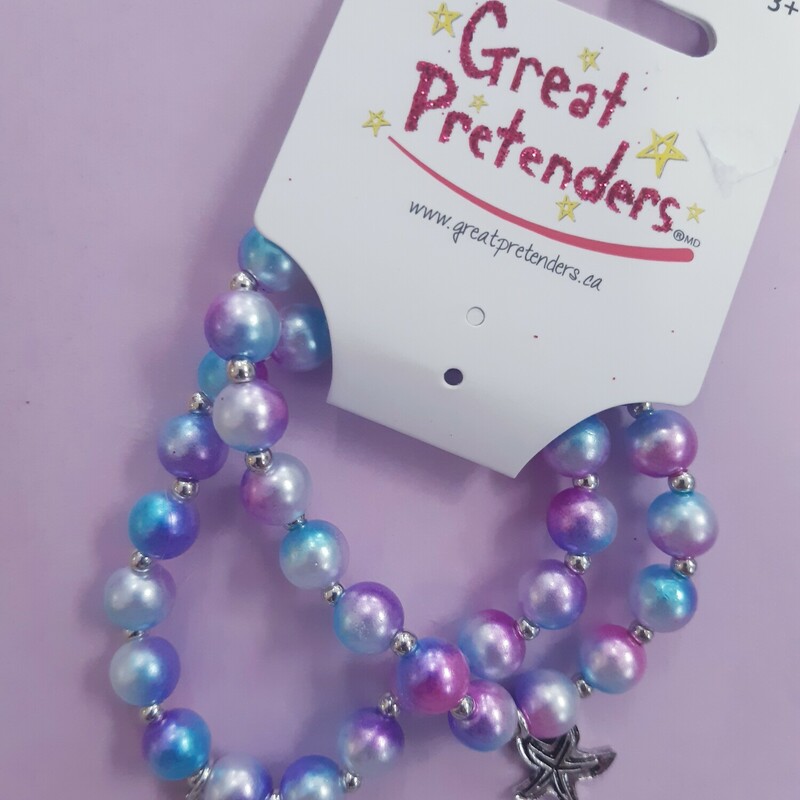 This set of 2 bracelets is perfect for any under the sea adventure or everyday mermaid wear. Featuring purple and blue beads and two metal pendants. A fun sea horse and a detailed star fish. Make sure to grab the matching necklace for double the fun!