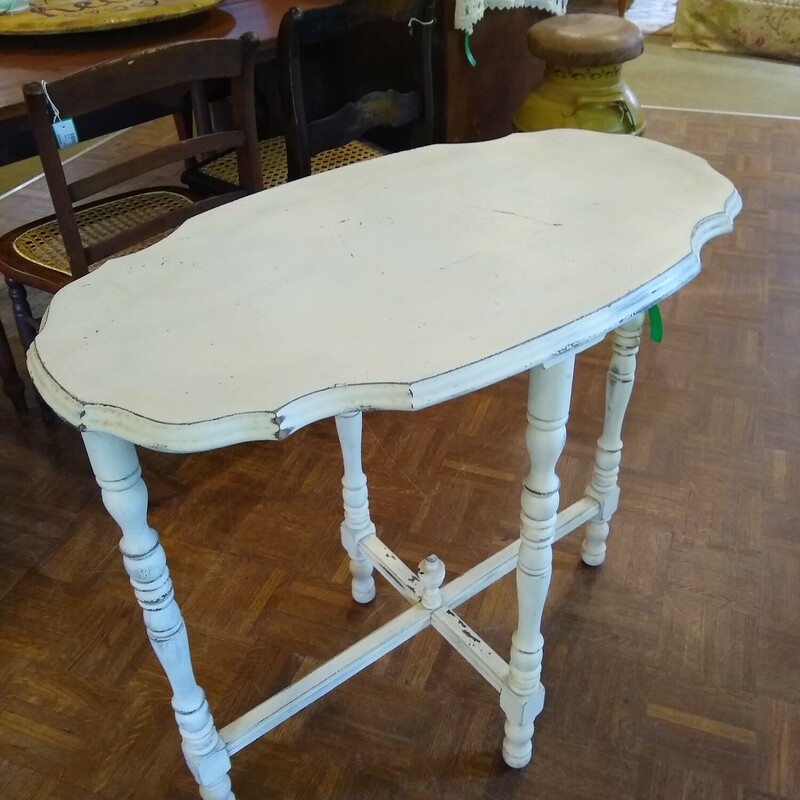 White Distressed Table

Pretty white table with distressed finish.  Nice detail on the spindle legs,

Size: 32 in wide X 17 in deep X 29 in high